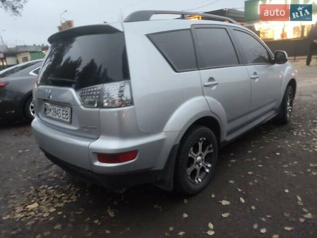 Серый Мицубиси Аутлендер, объемом двигателя 2 л и пробегом 205 тыс. км за 9600 $, фото 6 на Automoto.ua