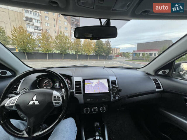 Серый Мицубиси Аутлендер, объемом двигателя 2.18 л и пробегом 220 тыс. км за 10999 $, фото 46 на Automoto.ua