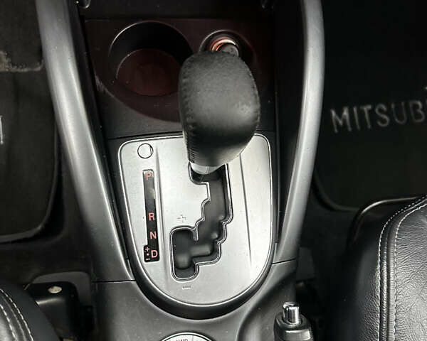 Серый Мицубиси Аутлендер, объемом двигателя 2.4 л и пробегом 226 тыс. км за 10200 $, фото 22 на Automoto.ua