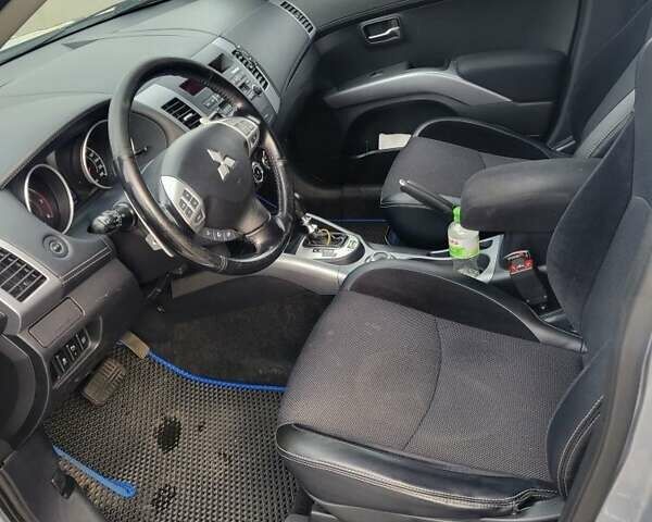 Серый Мицубиси Аутлендер, объемом двигателя 2.2 л и пробегом 175 тыс. км за 10999 $, фото 4 на Automoto.ua