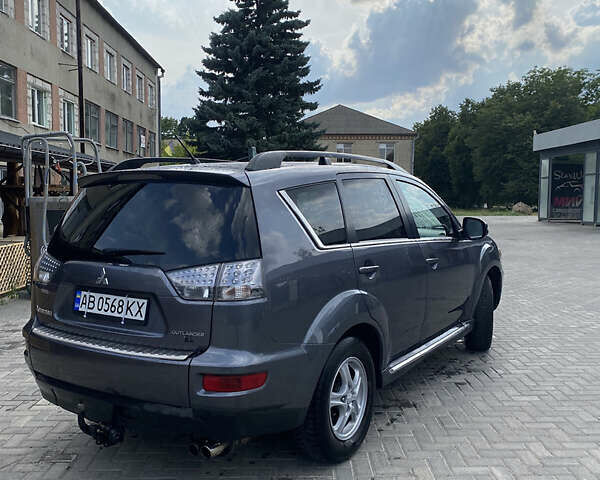Серый Мицубиси Аутлендер, объемом двигателя 2.27 л и пробегом 220 тыс. км за 11300 $, фото 1 на Automoto.ua