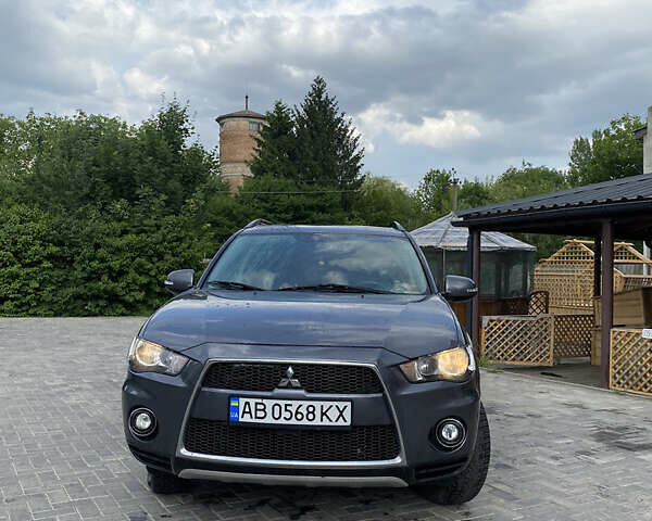Серый Мицубиси Аутлендер, объемом двигателя 2.27 л и пробегом 220 тыс. км за 11300 $, фото 4 на Automoto.ua