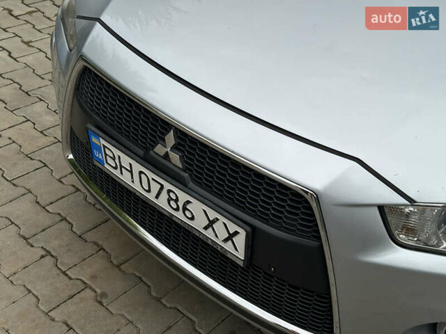 Серый Мицубиси Аутлендер, объемом двигателя 2.36 л и пробегом 145 тыс. км за 11200 $, фото 16 на Automoto.ua