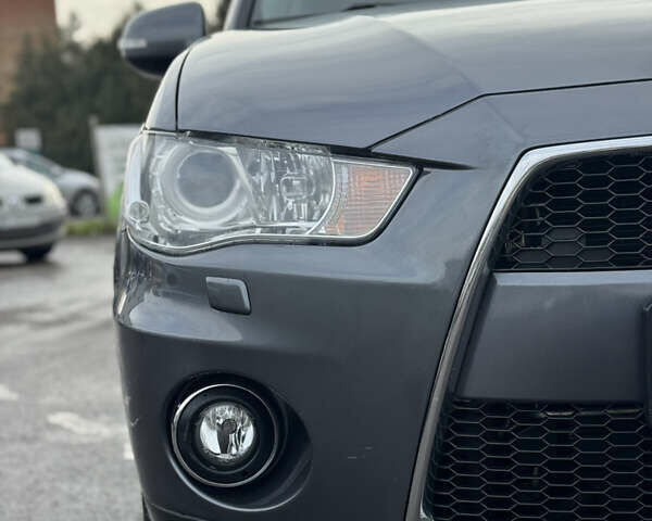 Серый Мицубиси Аутлендер, объемом двигателя 2.2 л и пробегом 211 тыс. км за 11999 $, фото 9 на Automoto.ua