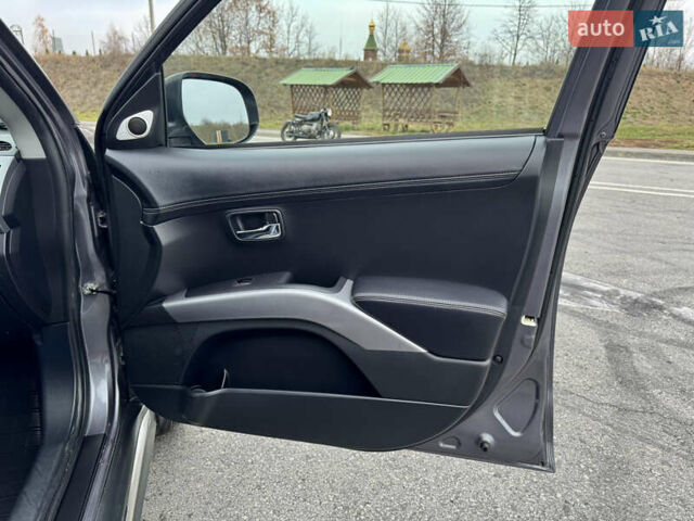 Серый Мицубиси Аутлендер, объемом двигателя 2.2 л и пробегом 160 тыс. км за 11350 $, фото 39 на Automoto.ua