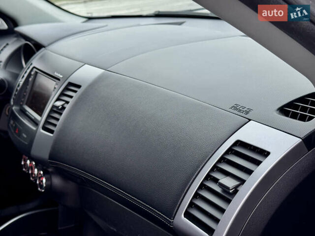 Серый Мицубиси Аутлендер, объемом двигателя 2.2 л и пробегом 160 тыс. км за 11350 $, фото 37 на Automoto.ua