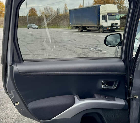 Міцубісі Аутлендер 2011 у Полтаві на Automoto.ua Сірий Міцубісі Аутлендер, об'ємом двигуна 2.2 л та пробігом 252 тис. км за 11150 $, фото 28 на Automoto.ua