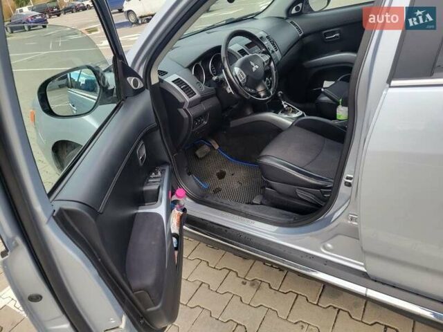Серый Мицубиси Аутлендер, объемом двигателя 2.2 л и пробегом 175 тыс. км за 10999 $, фото 7 на Automoto.ua