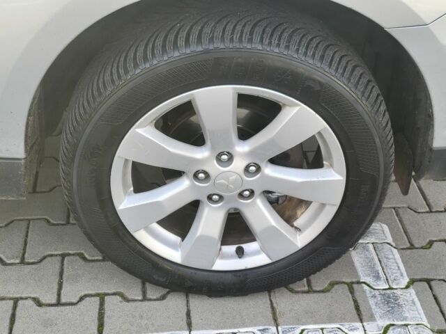 Серый Мицубиси Аутлендер, объемом двигателя 2.2 л и пробегом 175 тыс. км за 10999 $, фото 22 на Automoto.ua