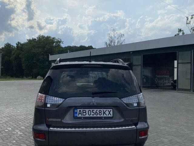 Сірий Міцубісі Аутлендер, об'ємом двигуна 2.3 л та пробігом 215 тис. км за 11150 $, фото 3 на Automoto.ua