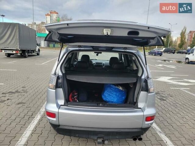 Серый Мицубиси Аутлендер, объемом двигателя 2.2 л и пробегом 175 тыс. км за 10999 $, фото 12 на Automoto.ua