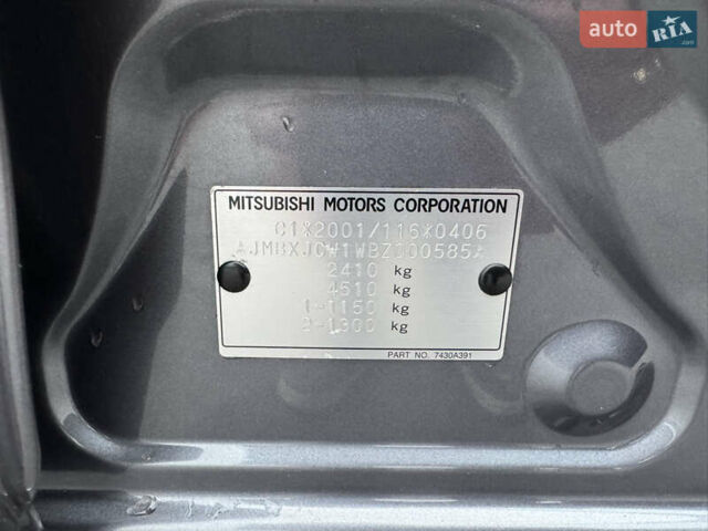 Серый Мицубиси Аутлендер, объемом двигателя 2.2 л и пробегом 160 тыс. км за 11350 $, фото 51 на Automoto.ua