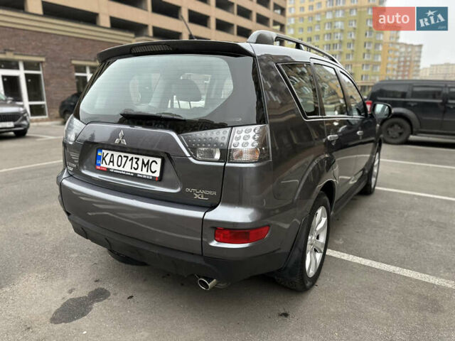 Серый Мицубиси Аутлендер, объемом двигателя 2.4 л и пробегом 226 тыс. км за 10200 $, фото 8 на Automoto.ua
