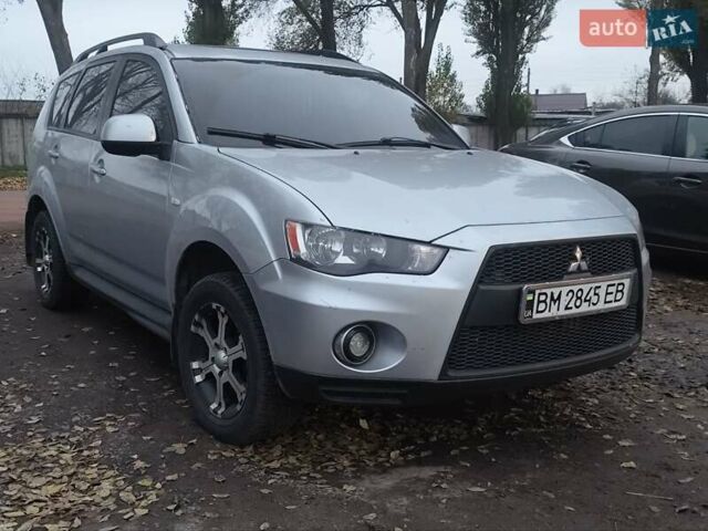 Серый Мицубиси Аутлендер, объемом двигателя 2 л и пробегом 205 тыс. км за 9600 $, фото 9 на Automoto.ua