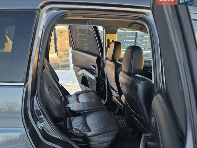 Серый Мицубиси Аутлендер, объемом двигателя 2.27 л и пробегом 220 тыс. км за 11300 $, фото 6 на Automoto.ua