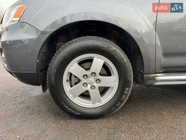 Серый Мицубиси Аутлендер, объемом двигателя 2.2 л и пробегом 211 тыс. км за 11999 $, фото 11 на Automoto.ua