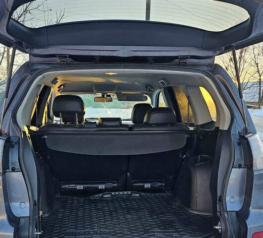 Серый Мицубиси Аутлендер, объемом двигателя 2.27 л и пробегом 220 тыс. км за 11300 $, фото 7 на Automoto.ua