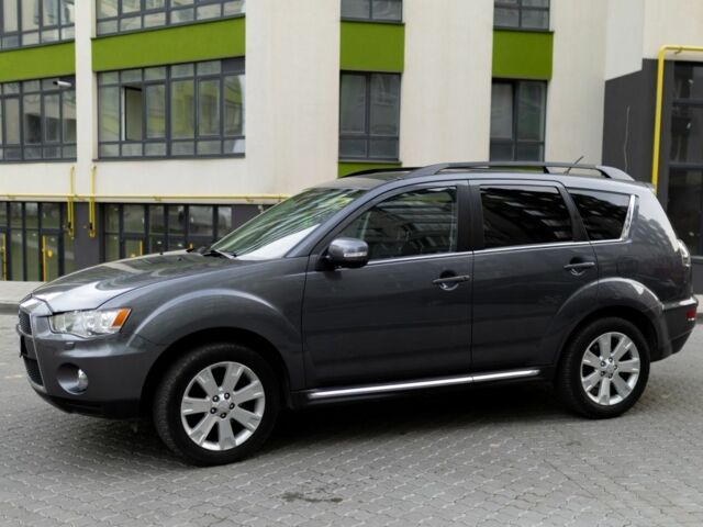 Серый Мицубиси Аутлендер, объемом двигателя 2.3 л и пробегом 288 тыс. км за 9700 $, фото 1 на Automoto.ua