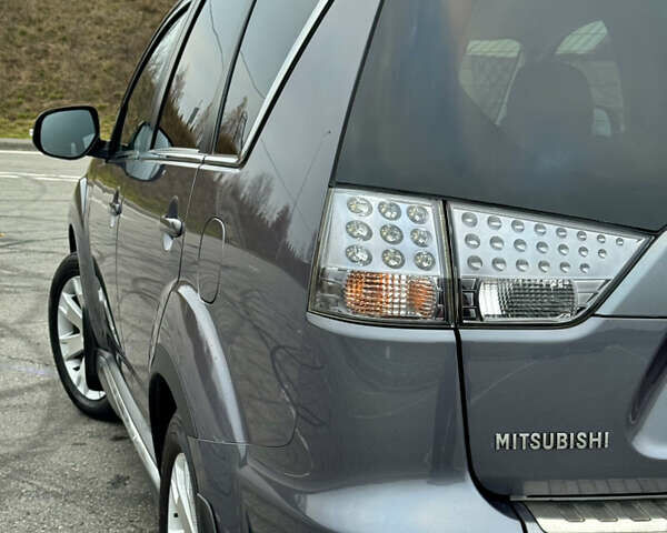 Серый Мицубиси Аутлендер, объемом двигателя 2.2 л и пробегом 160 тыс. км за 11350 $, фото 14 на Automoto.ua