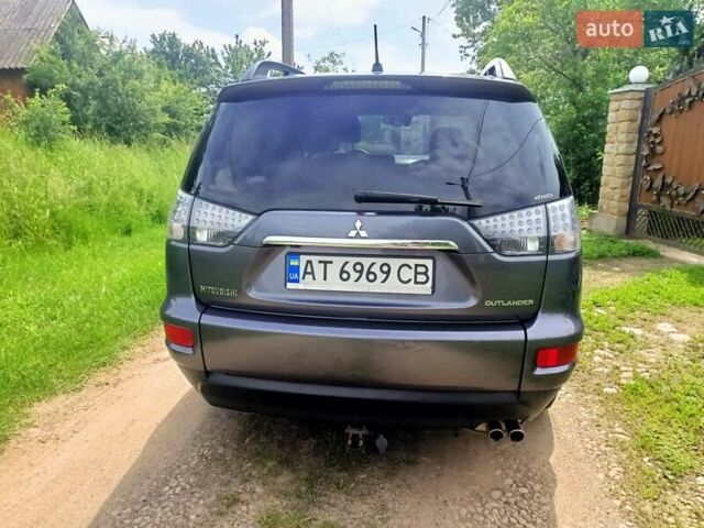 Сірий Міцубісі Аутлендер, об'ємом двигуна 2.27 л та пробігом 257 тис. км за 11300 $, фото 4 на Automoto.ua