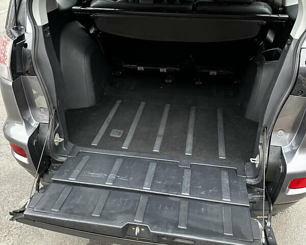 Серый Мицубиси Аутлендер, объемом двигателя 2.4 л и пробегом 226 тыс. км за 10200 $, фото 34 на Automoto.ua