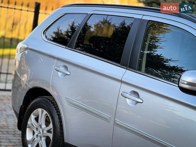 Серый Мицубиси Аутлендер, объемом двигателя 2.2 л и пробегом 189 тыс. км за 12800 $, фото 11 на Automoto.ua