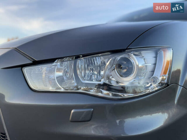 Серый Мицубиси Аутлендер, объемом двигателя 2.2 л и пробегом 171 тыс. км за 12700 $, фото 20 на Automoto.ua