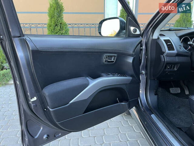 Серый Мицубиси Аутлендер, объемом двигателя 2.2 л и пробегом 186 тыс. км за 12350 $, фото 50 на Automoto.ua