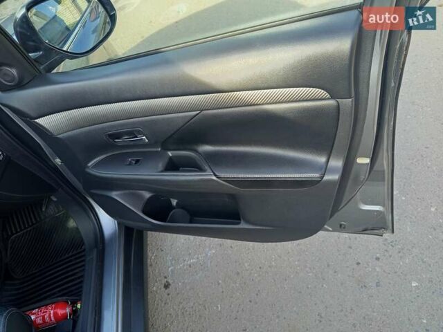 Серый Мицубиси Аутлендер, объемом двигателя 2.27 л и пробегом 240 тыс. км за 12150 $, фото 17 на Automoto.ua