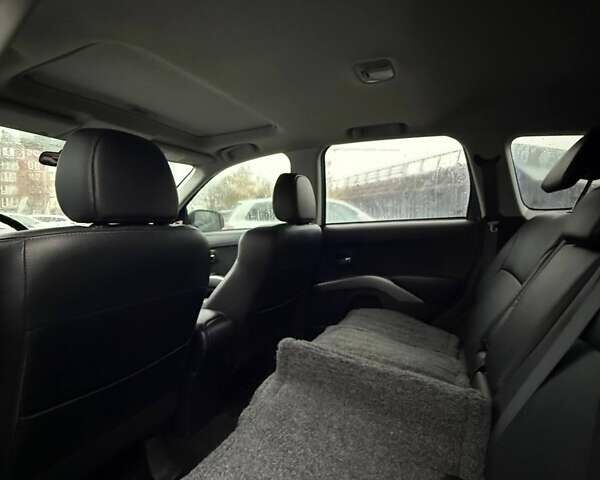 Серый Мицубиси Аутлендер, объемом двигателя 2.3 л и пробегом 160 тыс. км за 13900 $, фото 8 на Automoto.ua