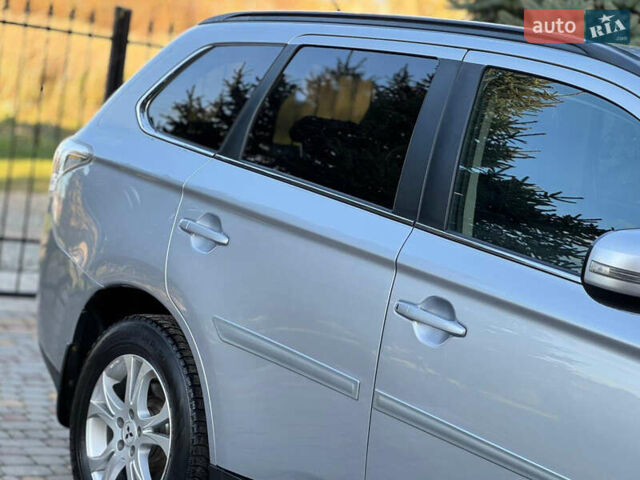 Серый Мицубиси Аутлендер, объемом двигателя 2.2 л и пробегом 188 тыс. км за 13500 $, фото 59 на Automoto.ua