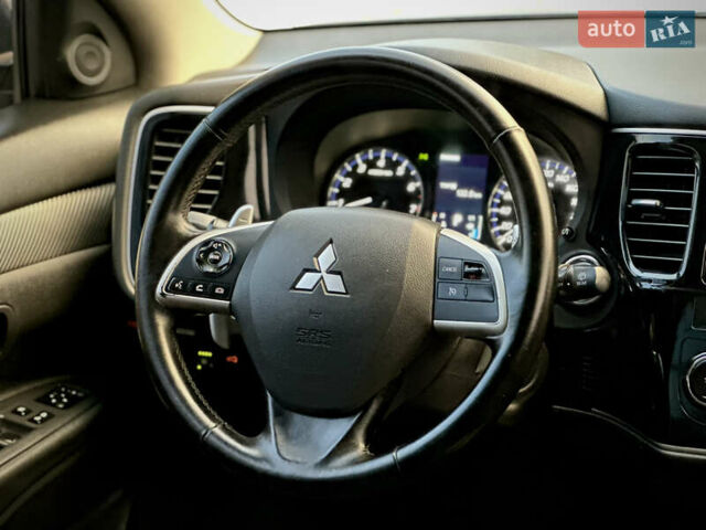 Сірий Міцубісі Аутлендер, об'ємом двигуна 2.36 л та пробігом 225 тис. км за 10500 $, фото 20 на Automoto.ua