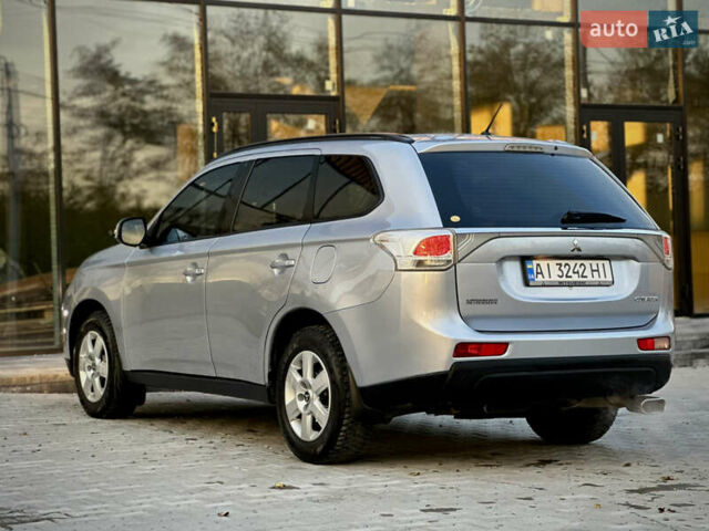 Сірий Міцубісі Аутлендер, об'ємом двигуна 2.36 л та пробігом 225 тис. км за 10500 $, фото 7 на Automoto.ua