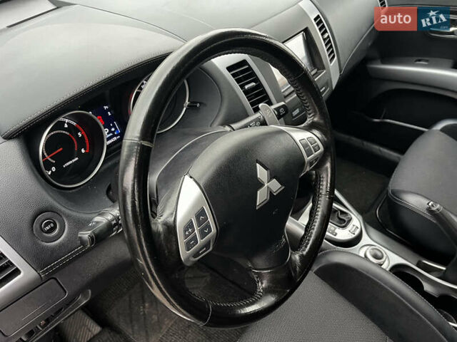 Серый Мицубиси Аутлендер, объемом двигателя 2.2 л и пробегом 206 тыс. км за 11999 $, фото 21 на Automoto.ua