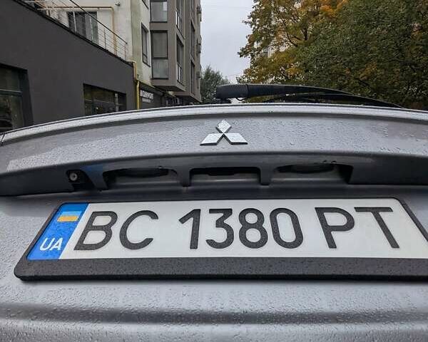 Серый Мицубиси Аутлендер, объемом двигателя 2.27 л и пробегом 232 тыс. км за 12500 $, фото 28 на Automoto.ua