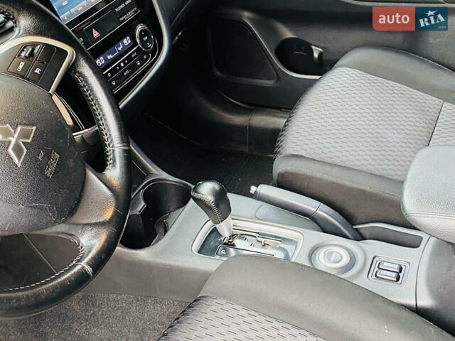 Серый Мицубиси Аутлендер, объемом двигателя 2.36 л и пробегом 131 тыс. км за 11800 $, фото 29 на Automoto.ua