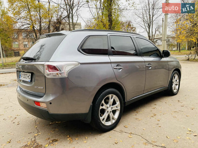 Серый Мицубиси Аутлендер, объемом двигателя 2.36 л и пробегом 131 тыс. км за 11800 $, фото 18 на Automoto.ua