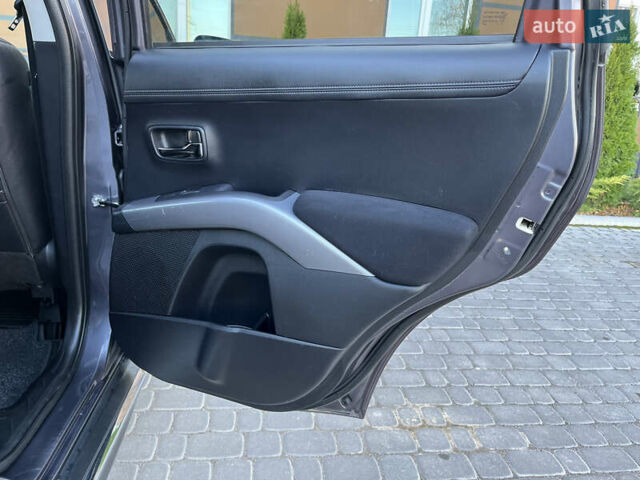 Серый Мицубиси Аутлендер, объемом двигателя 2.2 л и пробегом 186 тыс. км за 12350 $, фото 58 на Automoto.ua