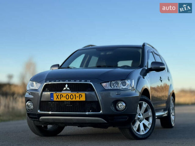Серый Мицубиси Аутлендер, объемом двигателя 2.2 л и пробегом 171 тыс. км за 12700 $, фото 4 на Automoto.ua