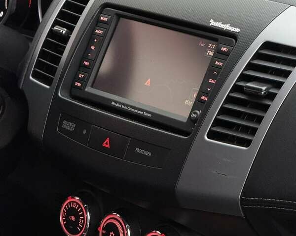 Серый Мицубиси Аутлендер, объемом двигателя 2.3 л и пробегом 160 тыс. км за 13900 $, фото 12 на Automoto.ua