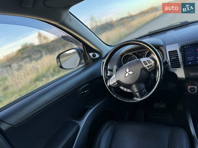 Серый Мицубиси Аутлендер, объемом двигателя 2.2 л и пробегом 171 тыс. км за 12700 $, фото 80 на Automoto.ua