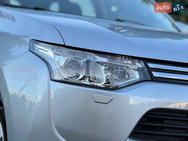 Серый Мицубиси Аутлендер, объемом двигателя 2.2 л и пробегом 188 тыс. км за 13500 $, фото 11 на Automoto.ua