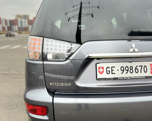 Серый Мицубиси Аутлендер, объемом двигателя 2.2 л и пробегом 206 тыс. км за 11999 $, фото 15 на Automoto.ua