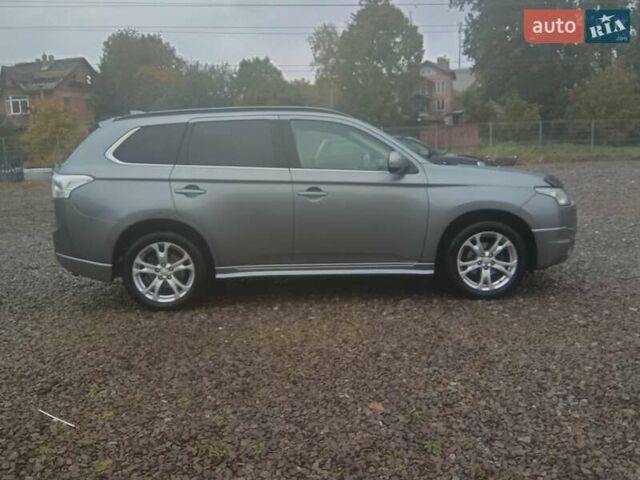 Серый Мицубиси Аутлендер, объемом двигателя 2.27 л и пробегом 232 тыс. км за 12500 $, фото 7 на Automoto.ua