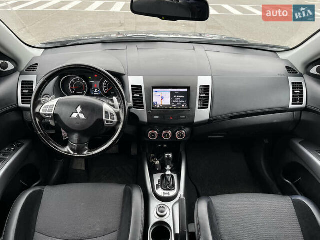 Серый Мицубиси Аутлендер, объемом двигателя 2.2 л и пробегом 206 тыс. км за 11999 $, фото 17 на Automoto.ua