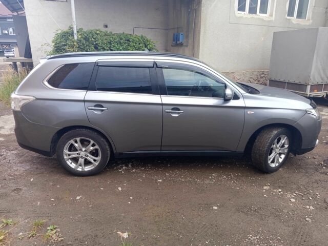 Сірий Міцубісі Аутлендер, об'ємом двигуна 2.3 л та пробігом 248 тис. км за 11550 $, фото 7 на Automoto.ua