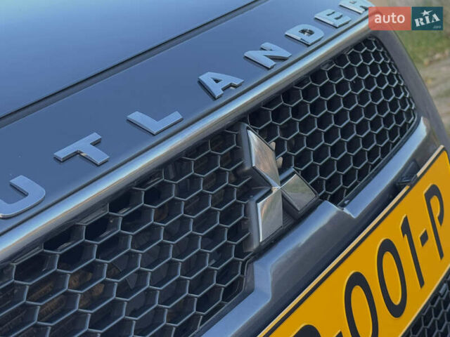 Серый Мицубиси Аутлендер, объемом двигателя 2.2 л и пробегом 171 тыс. км за 12700 $, фото 17 на Automoto.ua