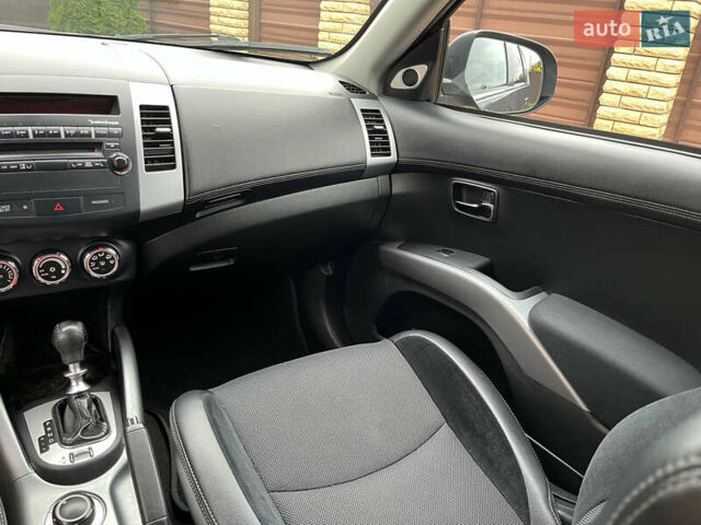 Серый Мицубиси Аутлендер, объемом двигателя 2.2 л и пробегом 186 тыс. км за 12350 $, фото 39 на Automoto.ua