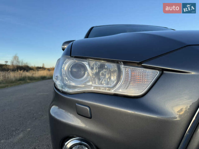 Серый Мицубиси Аутлендер, объемом двигателя 2.2 л и пробегом 171 тыс. км за 12700 $, фото 15 на Automoto.ua