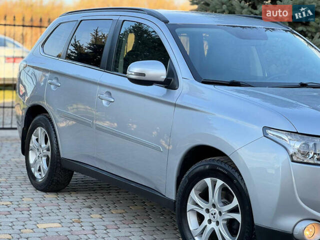 Серый Мицубиси Аутлендер, объемом двигателя 2.2 л и пробегом 188 тыс. км за 13500 $, фото 6 на Automoto.ua